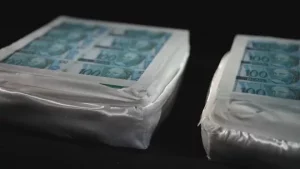 Presos golpistas que prometiam transformar papel em branco em dinheiro